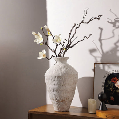 Frost textured ceramic table vase styled with floral branches on a console