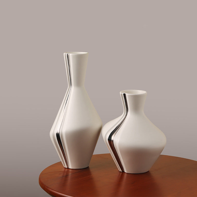 Grace ivory ceramic table vases styled on a wooden console table