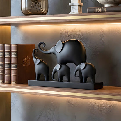 Kinship black resin elephant family showpiece with four elephants on a rectangular base for luxury console styling, view 2