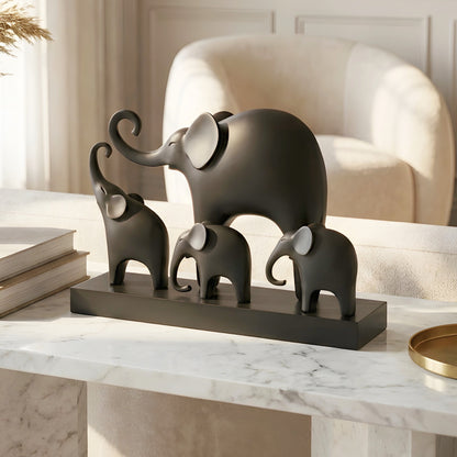Kinship black resin elephant family showpiece with four elephants on a rectangular base for luxury console styling, view 3