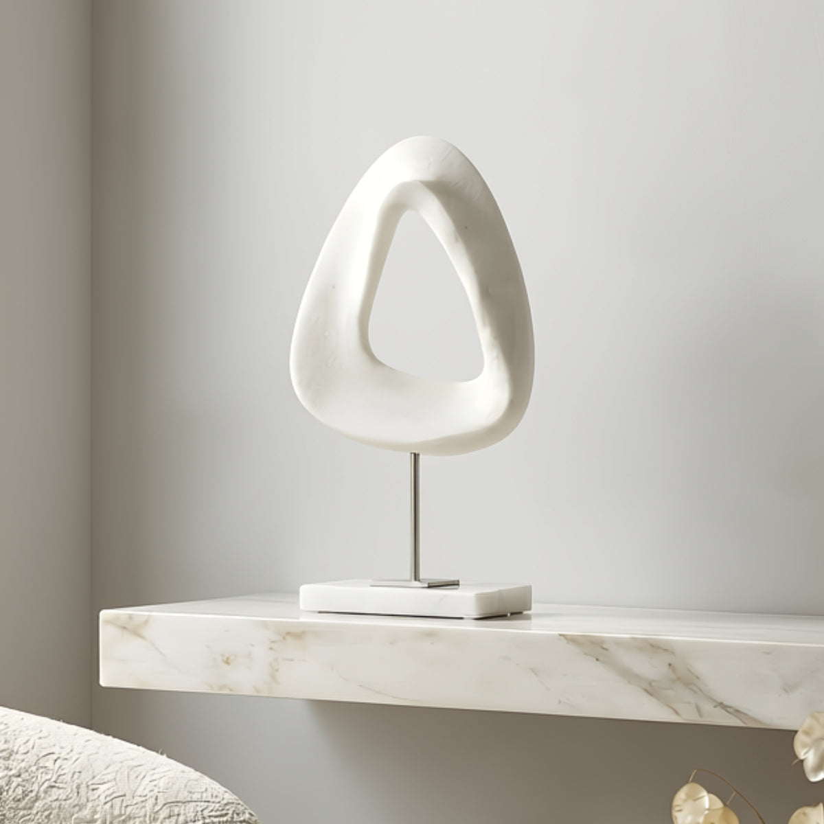 Loop designer white showpiece styled on a luxury entryway console