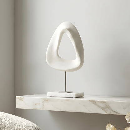Loop designer white showpiece styled on a luxury entryway console