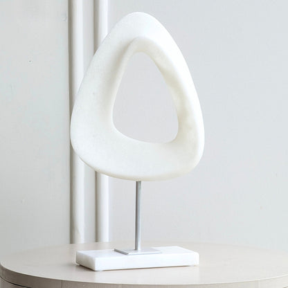 Close view of the organic loop form and textured white finish