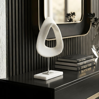 Loop white abstract sculpture styled on a luxury black console table