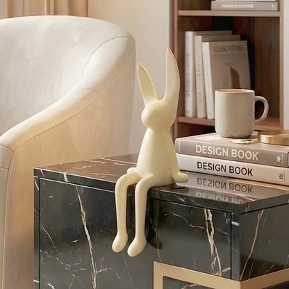Meadow beige rabbit showpiece styled on a side table beside a reading chair
