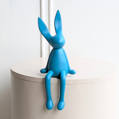 Meadow blue resin rabbit showpiece with long ears and dangling legs
