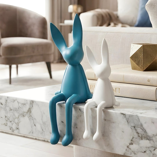 Meadow blue and white rabbit showpieces styled on a luxury living room coffee table