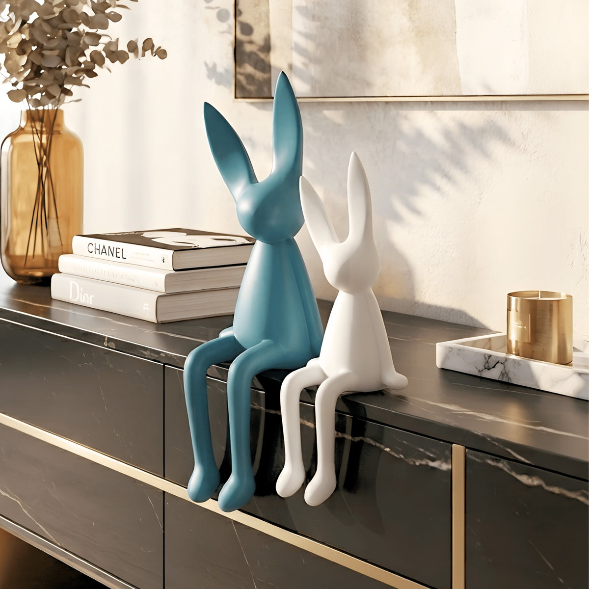 Meadow blue and white rabbit showpieces styled on a modern console table
