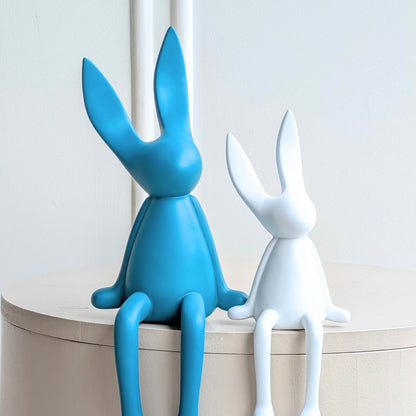 Meadow blue and white resin rabbit showpieces styled together