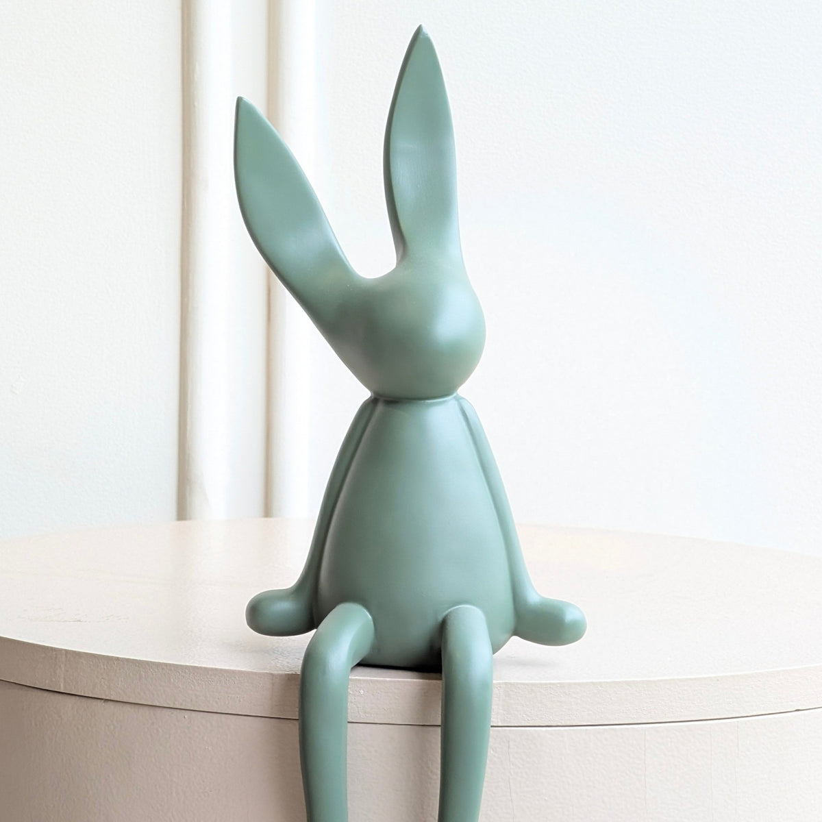 Meadow olive green resin rabbit showpiece with minimalist sculptural form