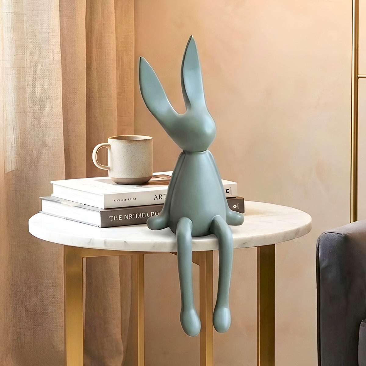 Meadow olive green rabbit showpiece styled on a marble side table