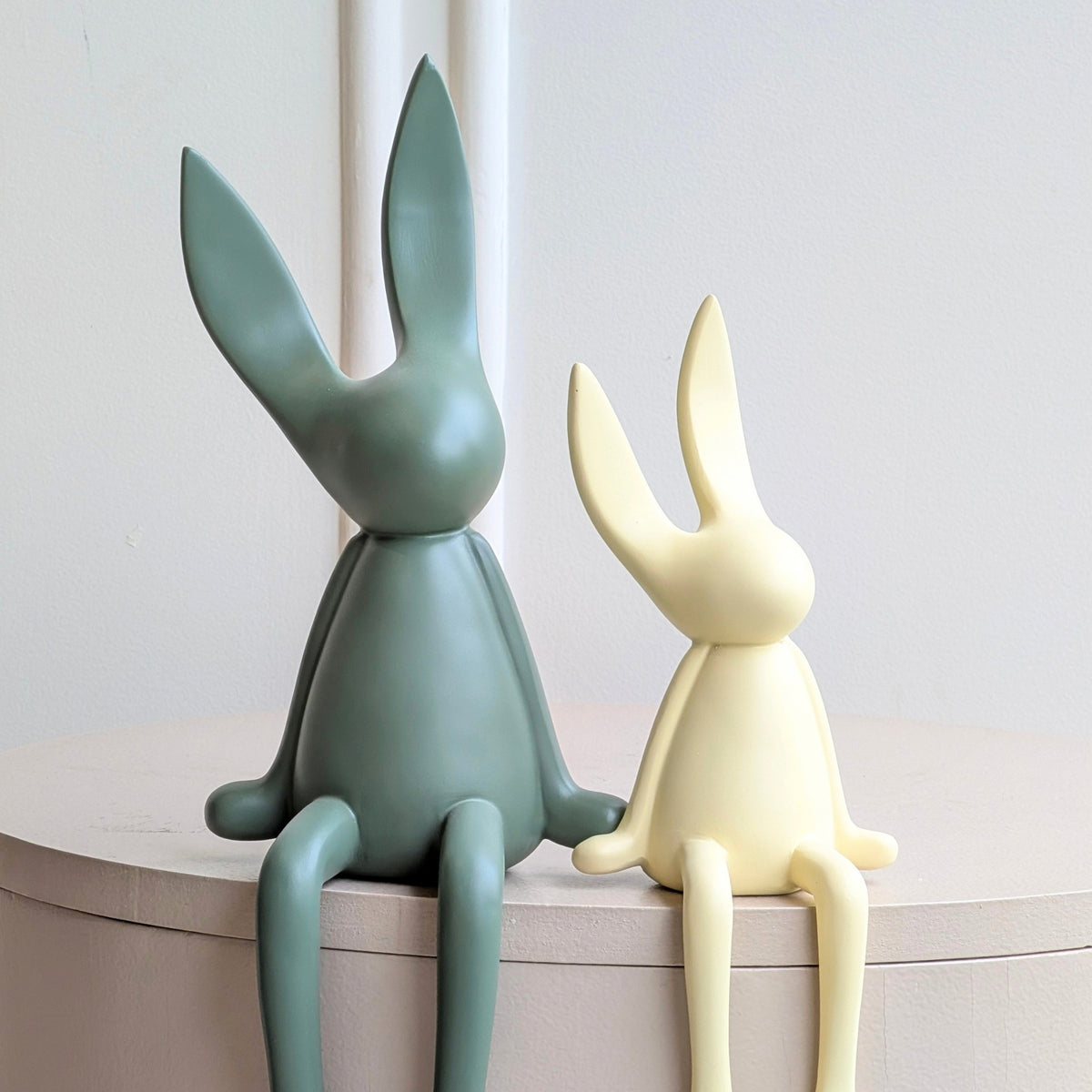 Meadow olive green and beige resin rabbit showpieces styled together