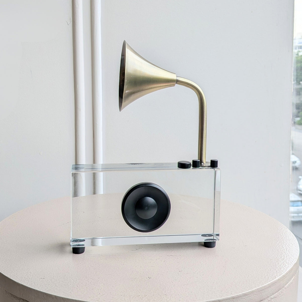 Melody crystal and metal radio showpiece front view on a round table