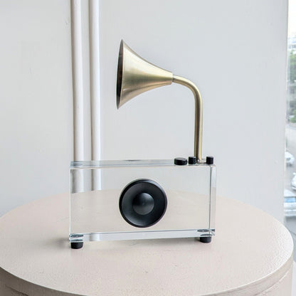 Melody crystal and metal radio showpiece front view on a round table