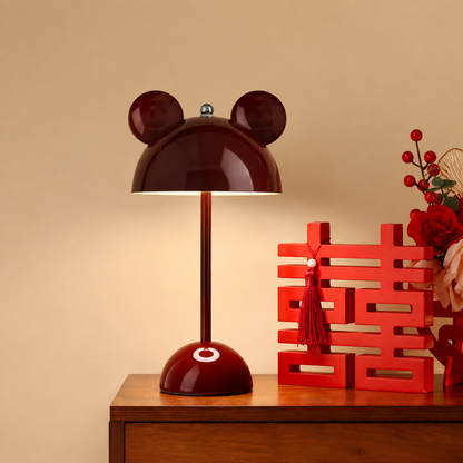 Mickey Glow table lamp styled on a console