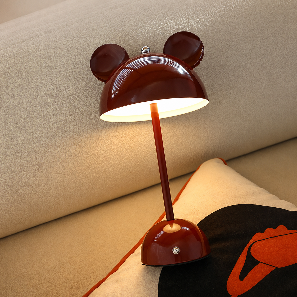 Mickey Glow table lamp in a reading corner