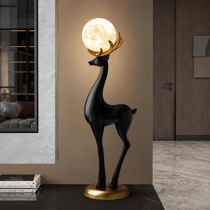 Moonstag black floor sculpture styled beside a console