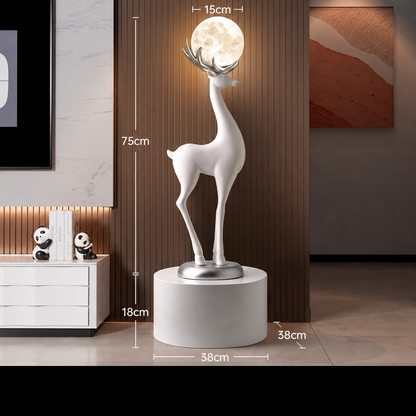Moonstag white deer floor lamp displayed on a pedestal
