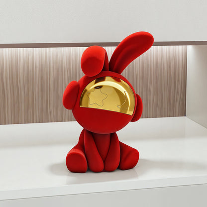 Moonstruck red velvet rabbit showpiece with gold moon and star detail by La Muse
