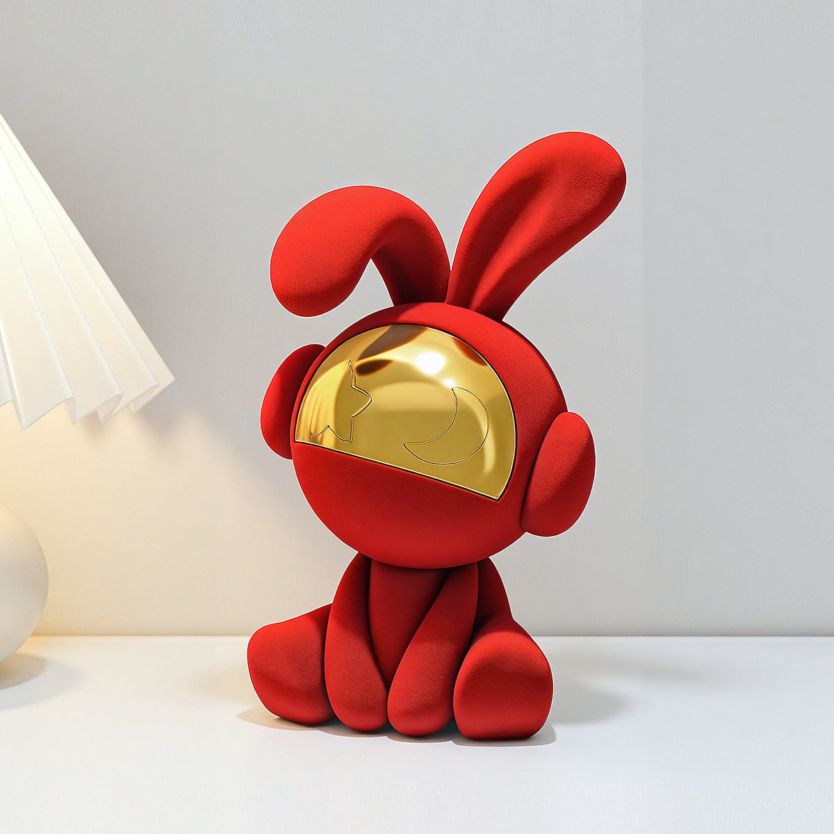 Moonstruck red velvet rabbit showpiece beside a table lamp