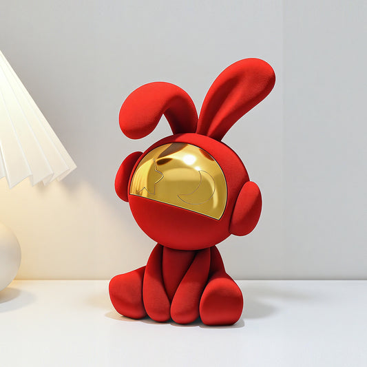 Moonstruck red velvet rabbit showpiece beside a table lamp