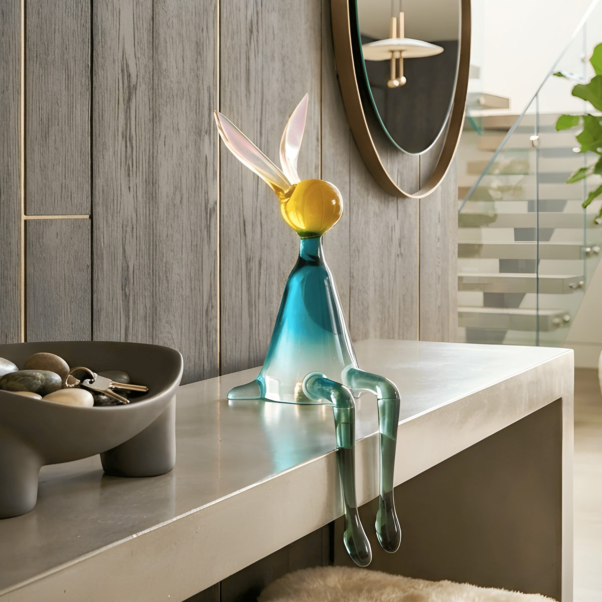 Moxie playful seated rabbit showpiece on a contemporary foyer console
