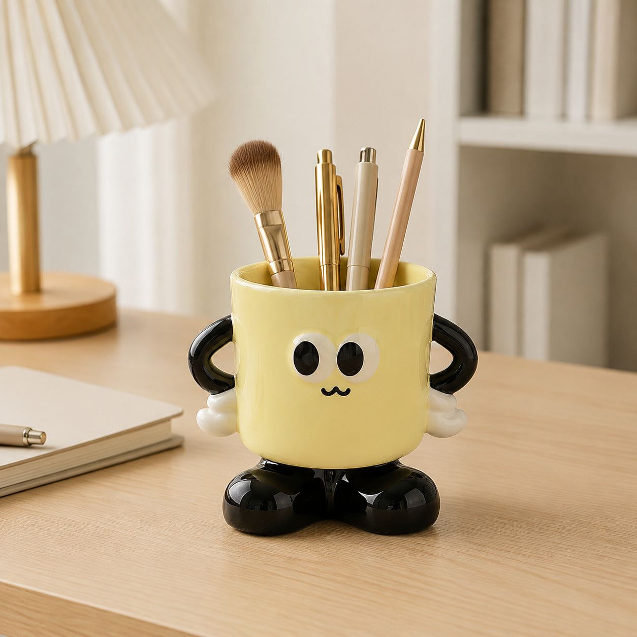 Mugsy ceramic organizer styled with pens on a modern work desk