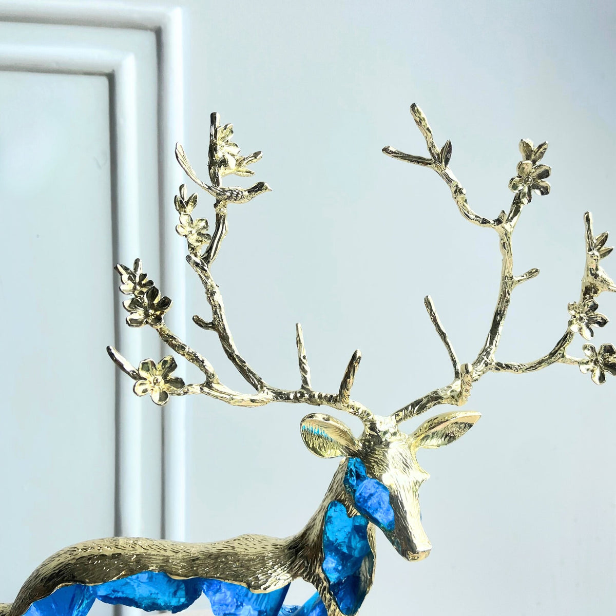 Gold-toned antler detail of the Mystique standing deer showpiece
