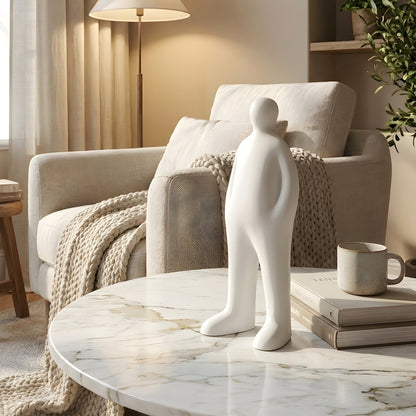 Off Duty White resin human showpiece styled on a marble coffee table