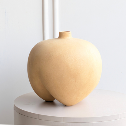 Ovelle sculptural ceramic vase in warm sand for luxury console and table decor