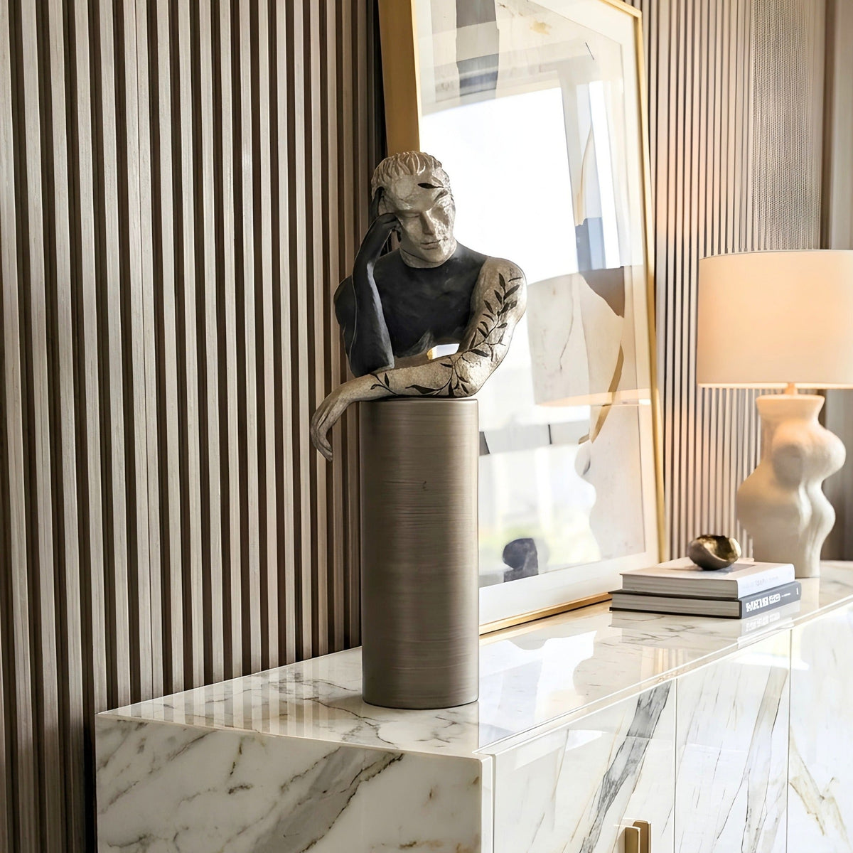 Pensive contemplative human showpiece styled on an entryway console