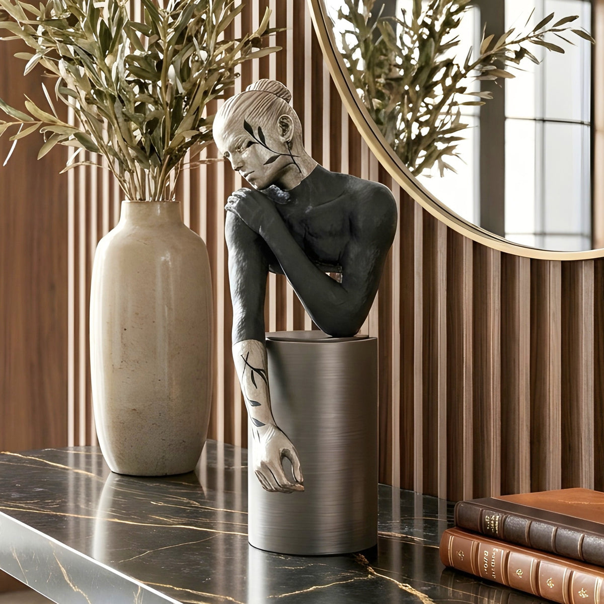 Poise black and silver woman showpiece styled on an entryway console