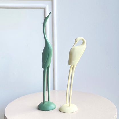 Poise resin bird showpieces set of two with tall mint green and ivory sculptural birds