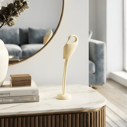 Ivory Poise resin bird sculpture styled on a sideboard for entryway and console table decor
