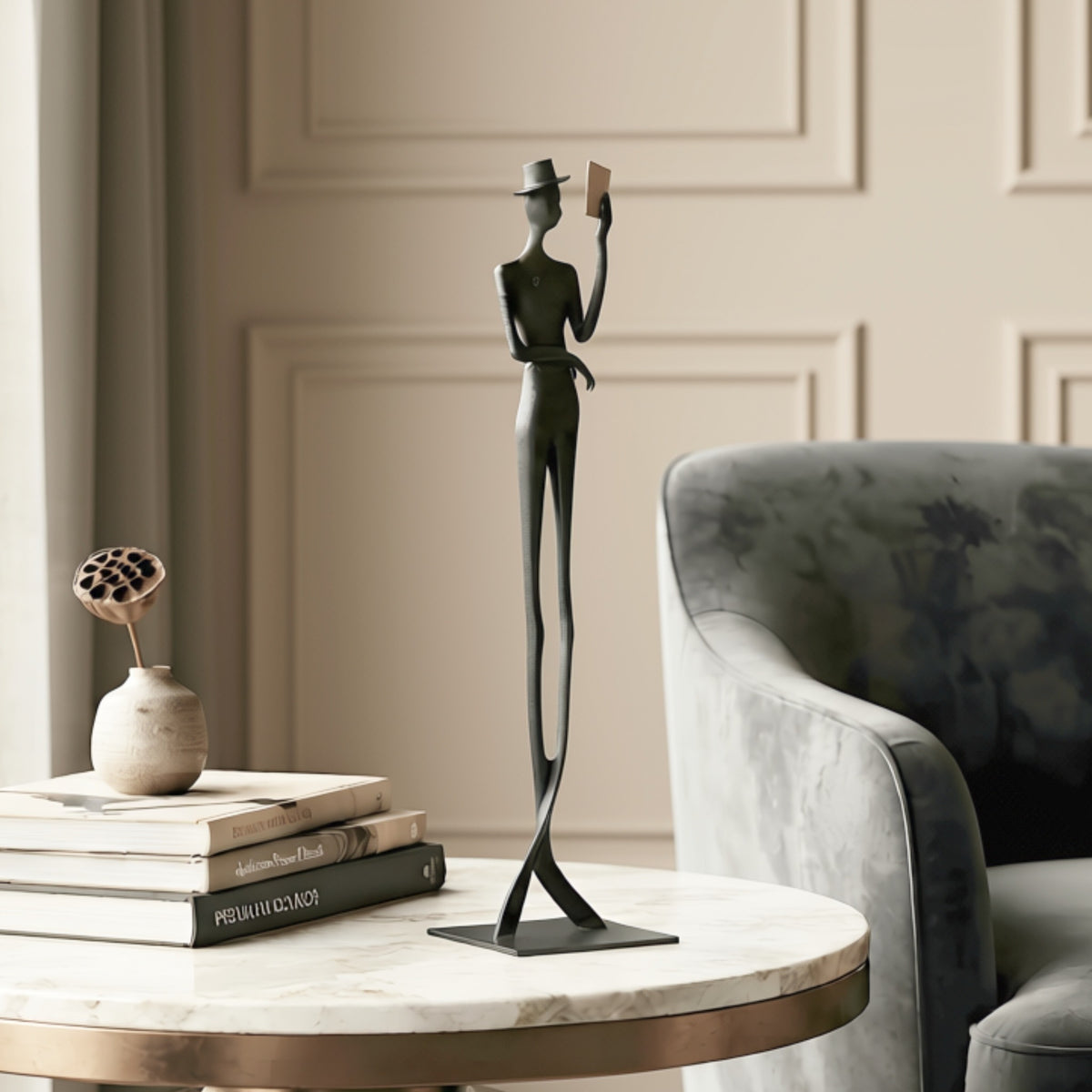 Poise tall metal gentleman showpiece styled on a round marble side table