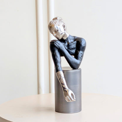 Poise black and silver woman showpiece with elongated sculptural form