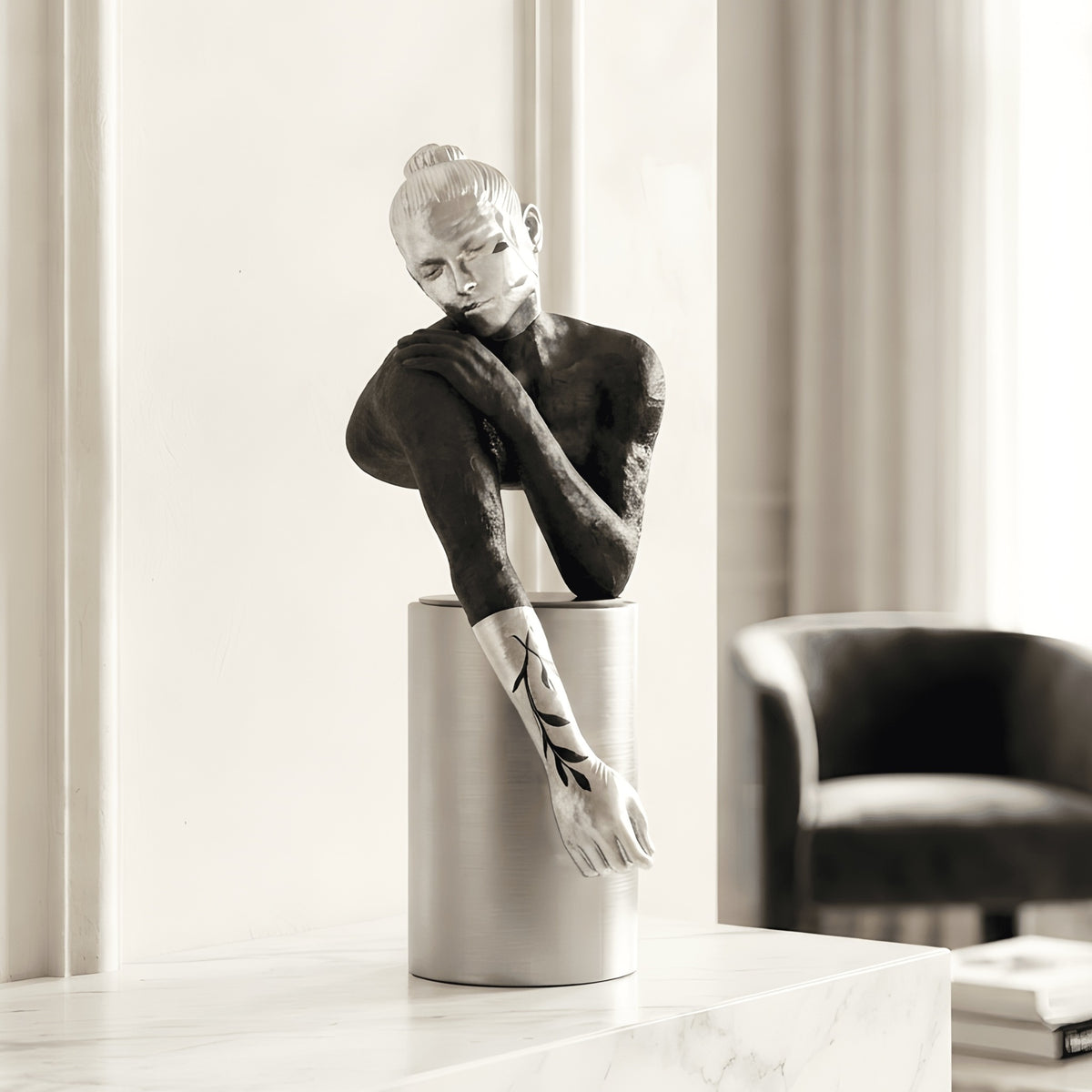 Poise black and silver resting woman figurine styled on a living room console
