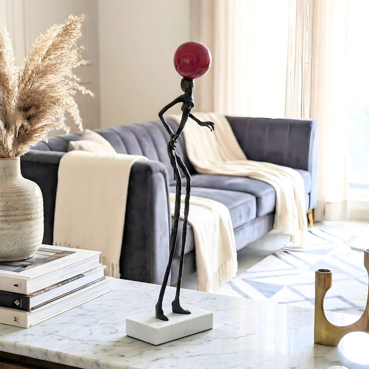 Redshift abstract human sculpture styled on a marble coffee table