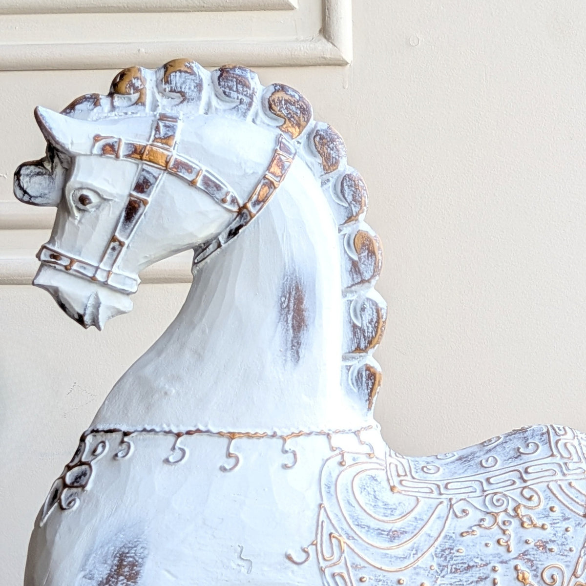Close-up of Regalia resin horse figurine showing sculpted bridle and antique metallic detailing