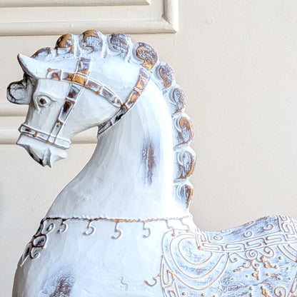 Close-up of Regalia resin horse figurine showing sculpted bridle and antique metallic detailing