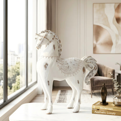 Large Regalia resin horse figurine styled beside a window in a modern living room