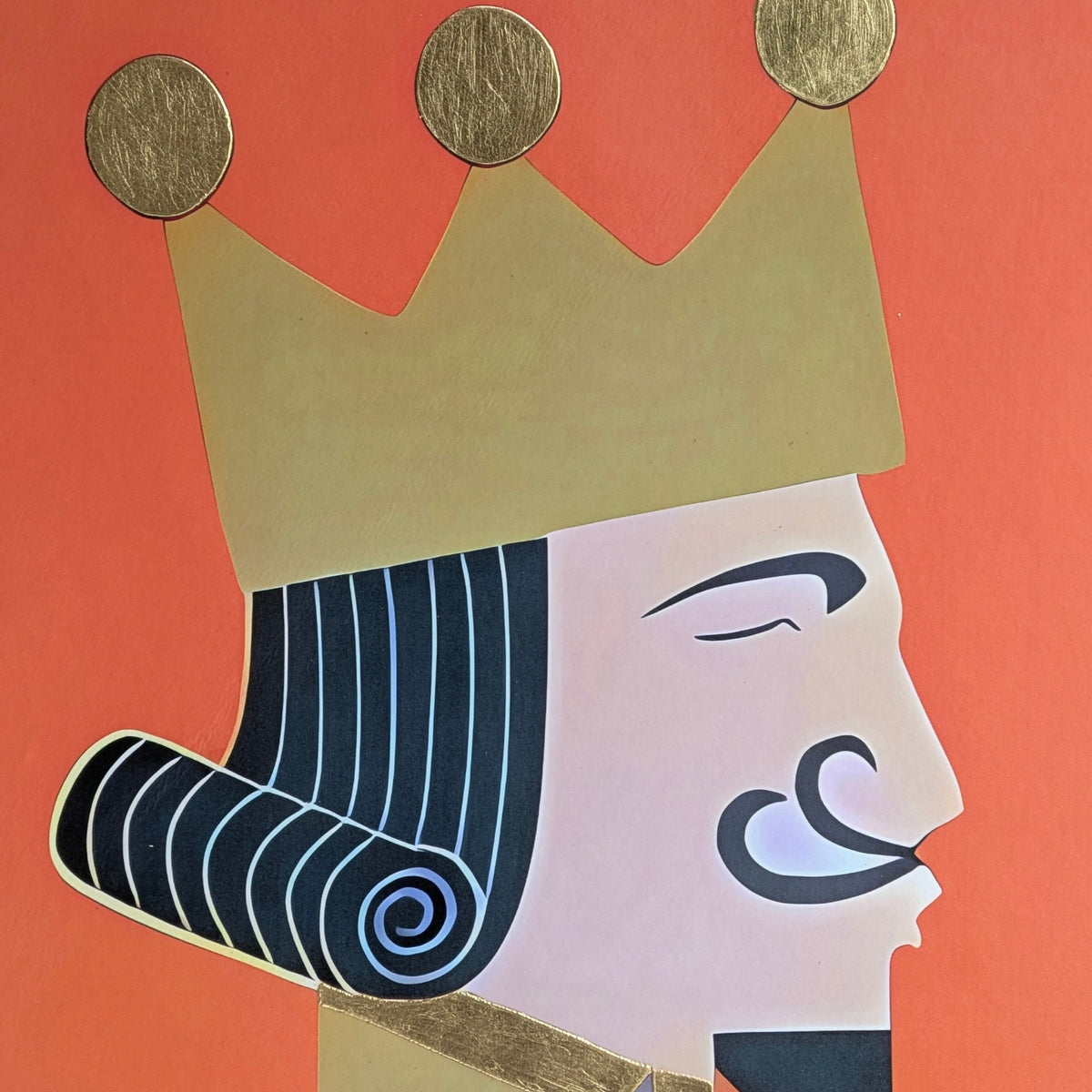 Close-up of the gold foiled crown and matte PU finish on the Royale King artwork