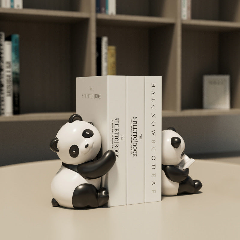 Snugglets panda bookends in a bookshelf setting
