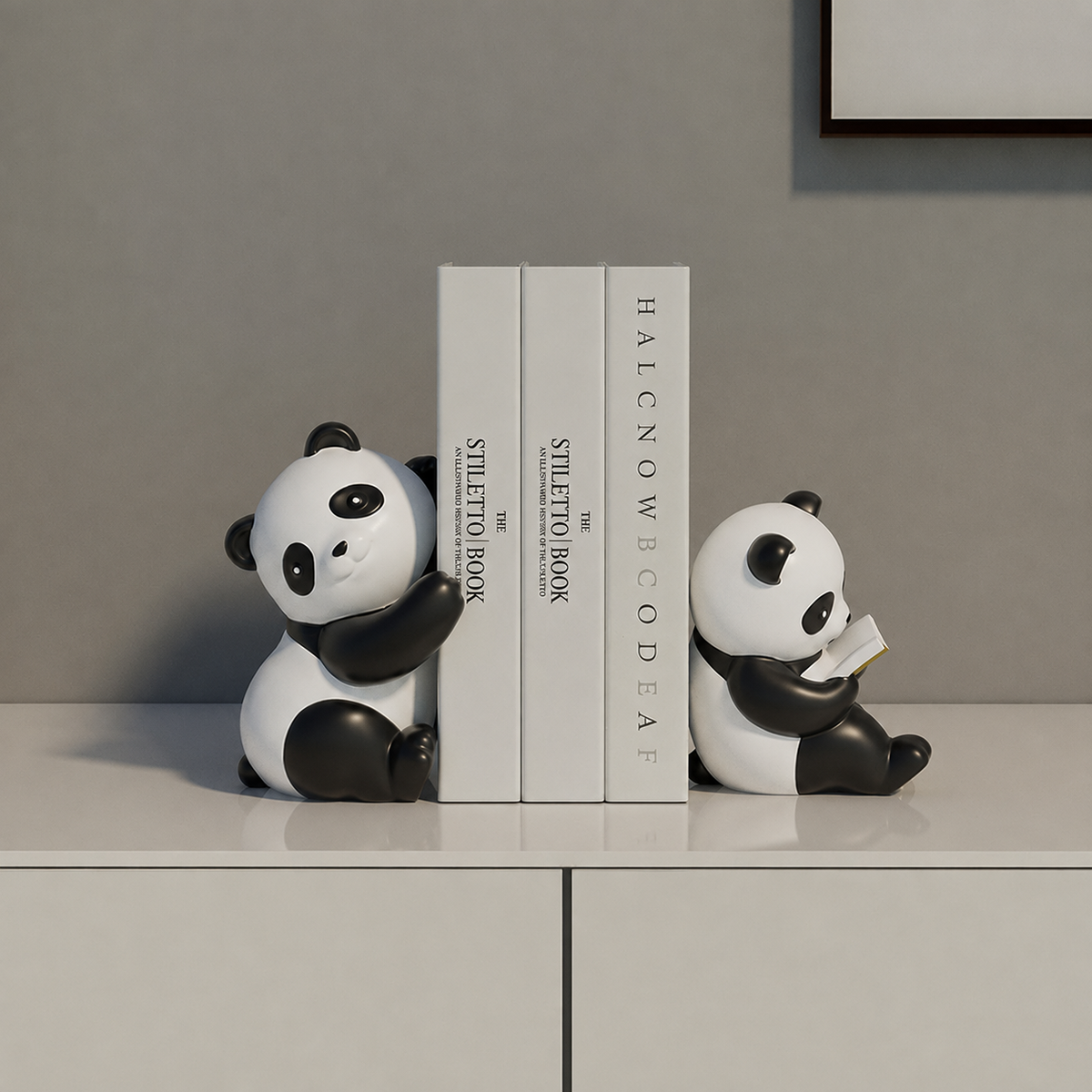Snugglets panda bookends styled on a shelf