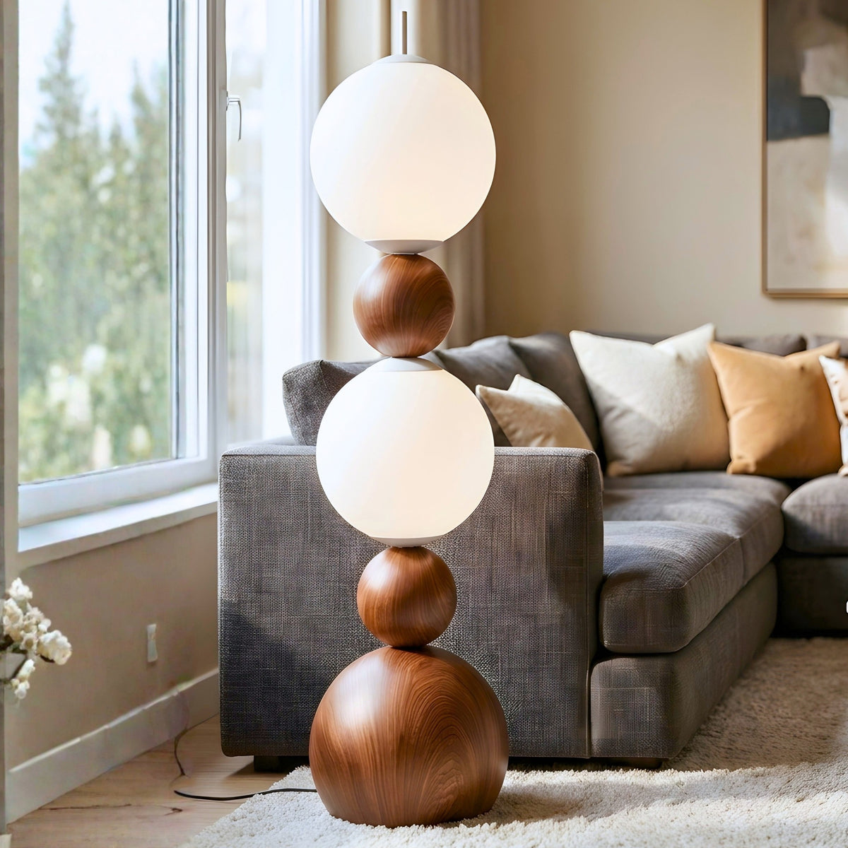 Solstice floor lamp beside a grey sofa in a contemporary living room