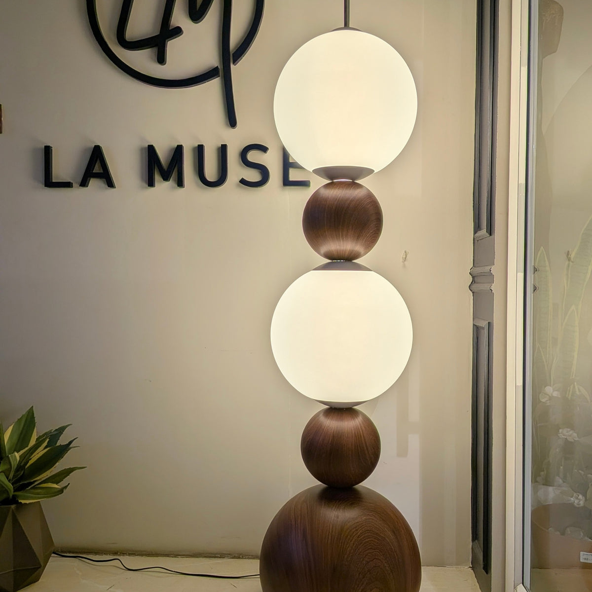 Solstice illuminated floor lamp displayed at the La Muse showroom