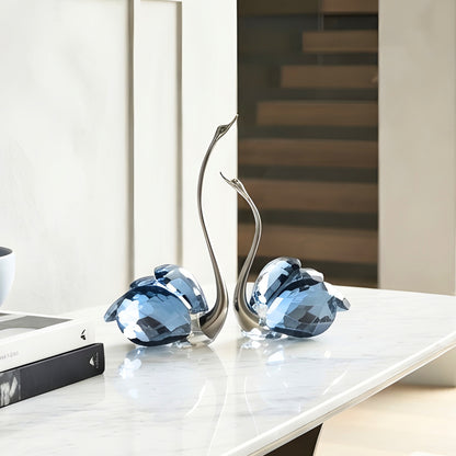 Soulmates blue crystal swan duo styled on a marble centre table
