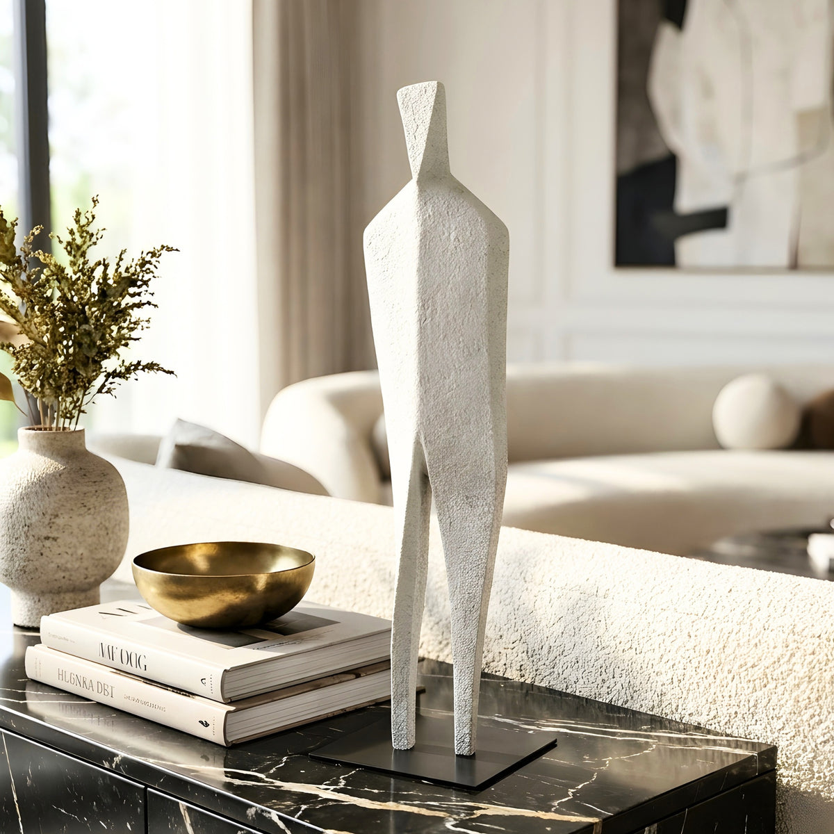 Stature modern abstract figure sculpture for luxury console styling in living room interiors