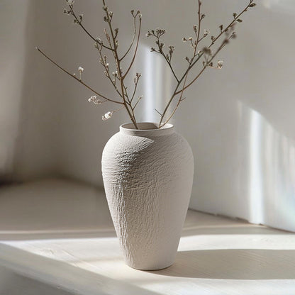 Strata large tall white textured ceramic vase styled on a console