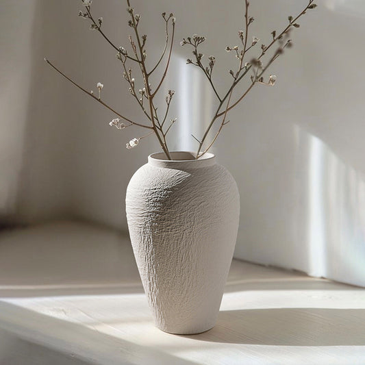 Strata large tall white textured ceramic vase styled on a console